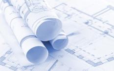 Image showing blueprints, one flat showing plans and some rolled up on top. Image showing blueprints, one flat showing plans and some rolled up on top.