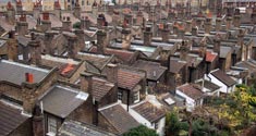 Aerial photos of a street of chimneys.